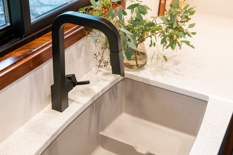 close up of sink with black faucet in kitchen remodel by Corvallis Custom Kitchen and Baths in Corvallis, Oregon