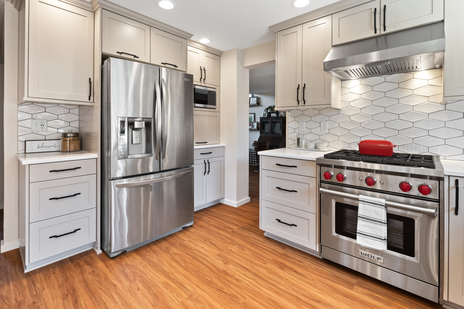 stainless steel appliances, hardwood floors, and light cabinets in remodeled kitchen by corvallis custom kitchens and baths in corvallis oregon stainless steel appliances, hardwood floors, and light cabinets in remodeled kitchen by corvallis custom kitchens and baths in corvallis oregon